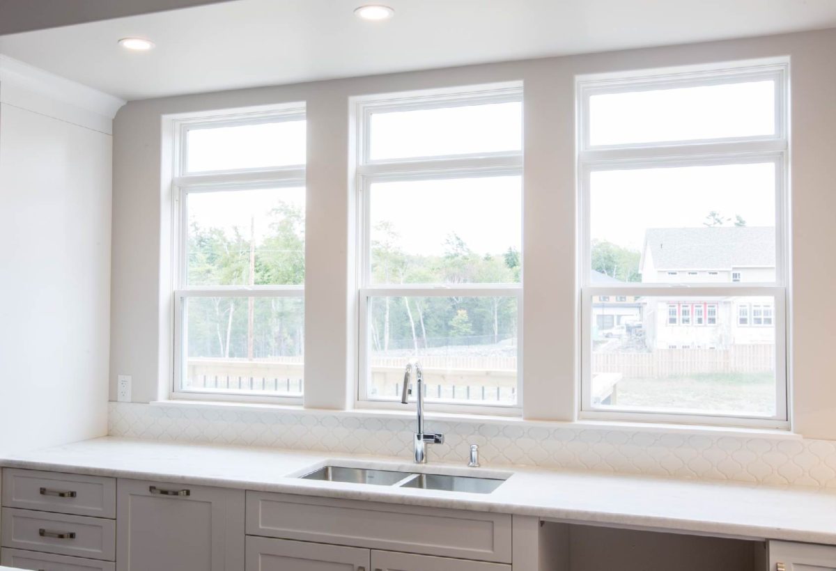 interior view of three single hung windows in kitchen