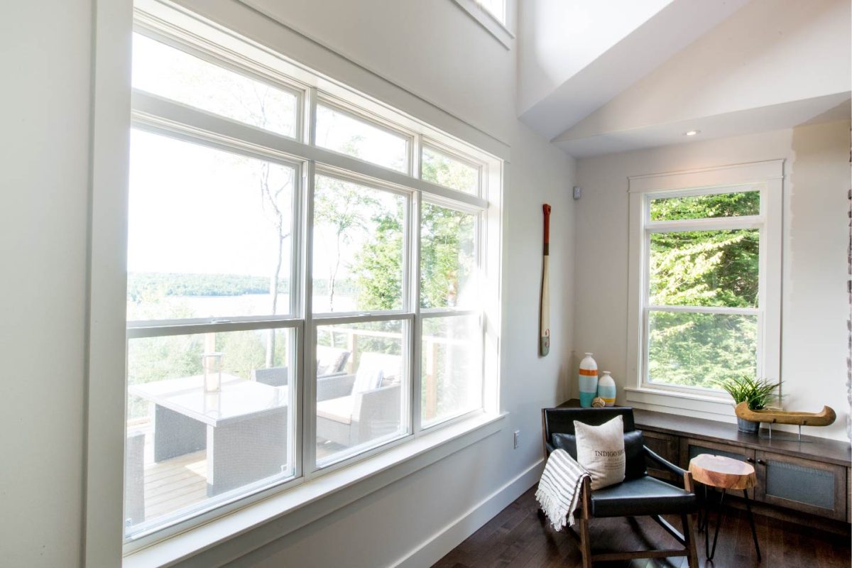 interior view of single hung windows overlooking a forest